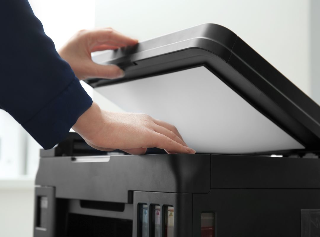 a person scanning paperwork